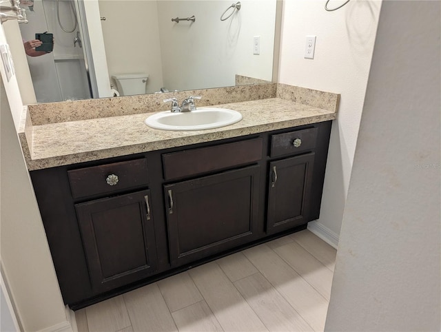 3103 Nova Scotia Way, New Smyrna Beach, FL 32168 - bathroom featuring vanity and toilet