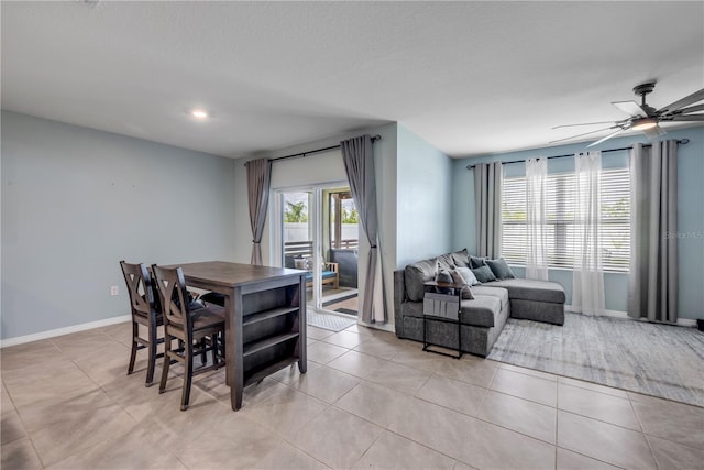 2731 Neverland Dr, New Smyrna Beach, FL 32168 - dining area with light tile patterned floors, ceiling fan, and recessed lighting