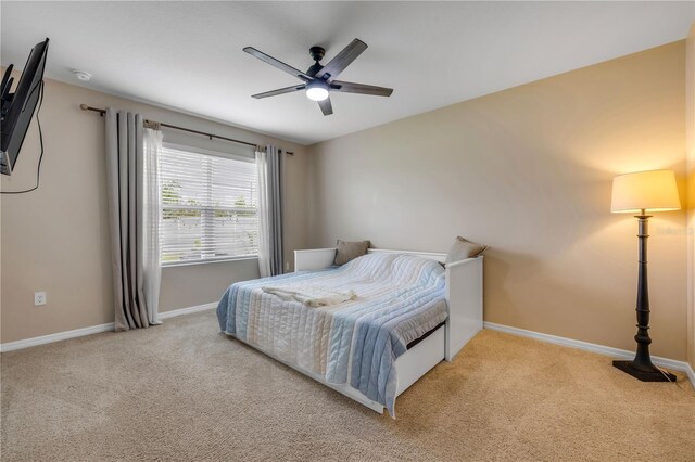 2731 Neverland Dr, New Smyrna Beach, FL 32168 - bedroom with carpet flooring and a ceiling fan