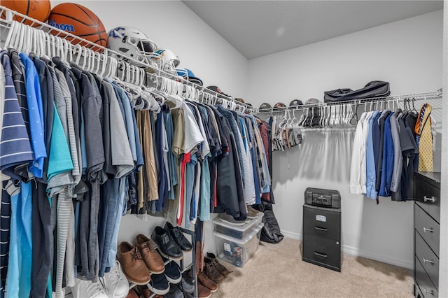 2731 Neverland Dr, New Smyrna Beach, FL 32168 - walk in closet featuring carpet flooring