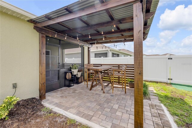 2731 Neverland Dr, New Smyrna Beach, FL 32168 - view of patio featuring outdoor dining area