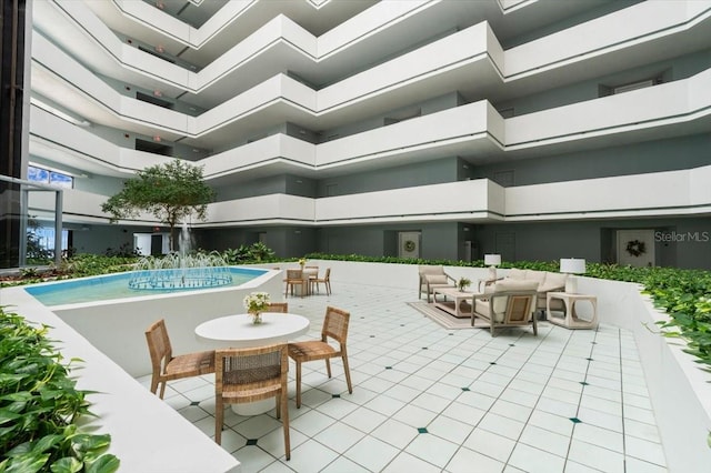 901 S Atlantic Ave Unit 202, Ormond Beach, FL 32176 - view of swimming pool featuring a patio