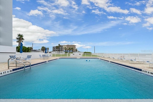 901 S Atlantic Ave Unit 202, Ormond Beach, FL 32176 - community pool featuring a patio