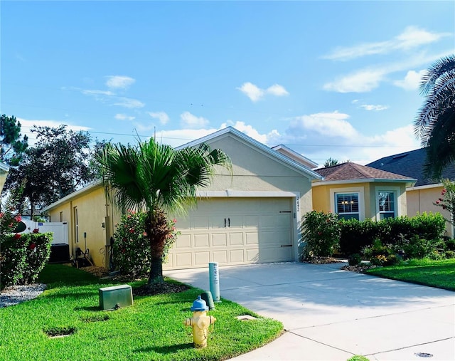 2672 Star Coral Ln, New Smyrna Beach, FL 32168 - ranch-style home with stucco siding, driveway, a front lawn, and an attached garage