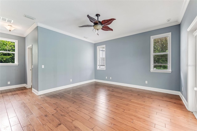 2360 Mooneyham Dr, New Smyrna Beach, FL 32168 - empty room featuring ceiling fan, light wood-style floors, and ornamental molding