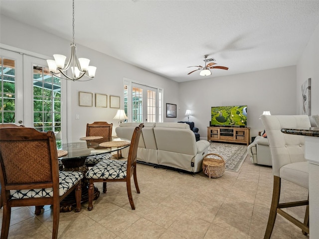 461 Luna Bella Ln, New Smyrna Beach, FL 32168 - bedroom with multiple windows, a chandelier, and ceiling fan