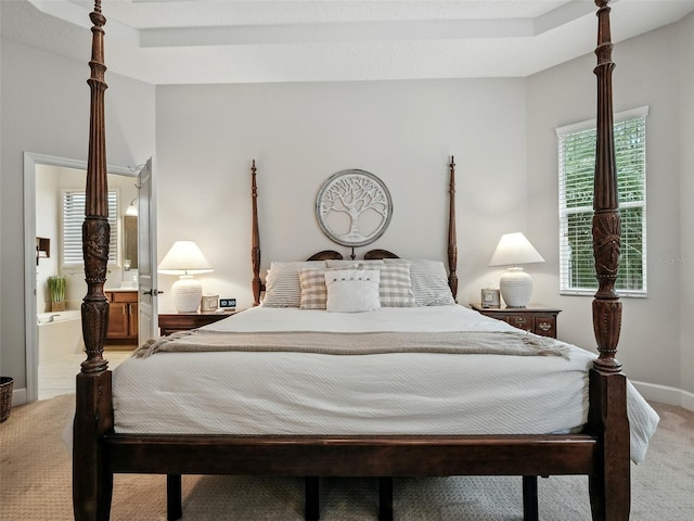 461 Luna Bella Ln, New Smyrna Beach, FL 32168 - bedroom featuring light carpet and ensuite bath
