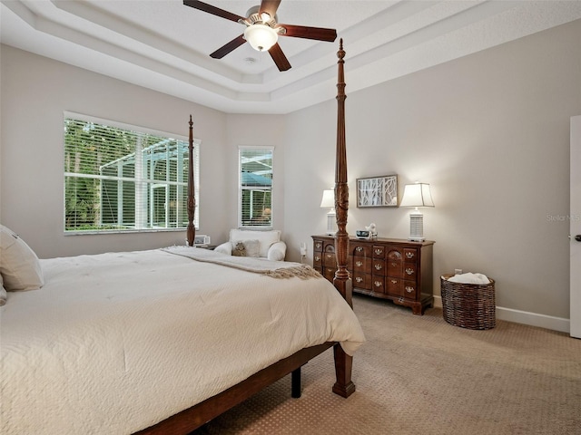 461 Luna Bella Ln, New Smyrna Beach, FL 32168 - bedroom featuring carpet floors, a raised ceiling, and a ceiling fan