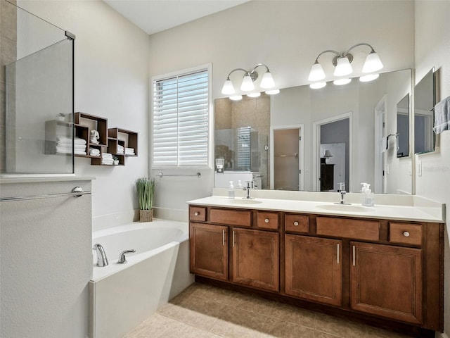 461 Luna Bella Ln, New Smyrna Beach, FL 32168 - bathroom with a shower stall, double vanity, a bath, and tile patterned flooring