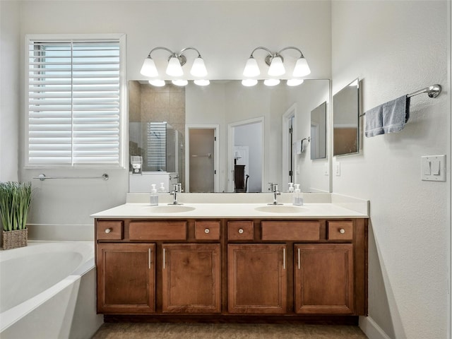 461 Luna Bella Ln, New Smyrna Beach, FL 32168 - full bathroom featuring a shower stall, double vanity, and a garden tub