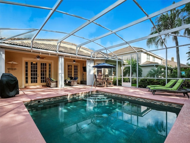 461 Luna Bella Ln, New Smyrna Beach, FL 32168 - rear view of house with french doors, a tile roof, a ceiling fan, a patio area, and an outdoor pool