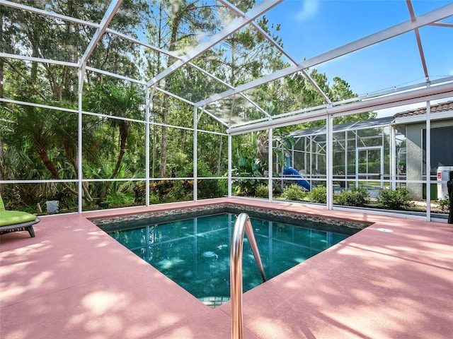 461 Luna Bella Ln, New Smyrna Beach, FL 32168 - swimming pool with a lanai and a patio
