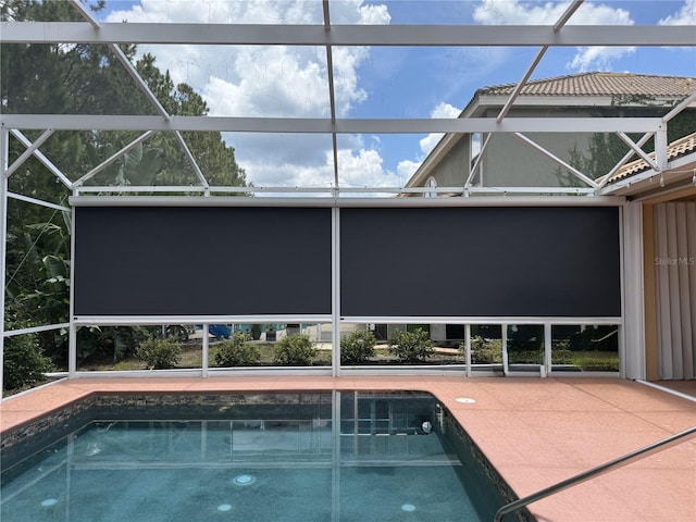 461 Luna Bella Ln, New Smyrna Beach, FL 32168 - swimming pool with a lanai and a patio area