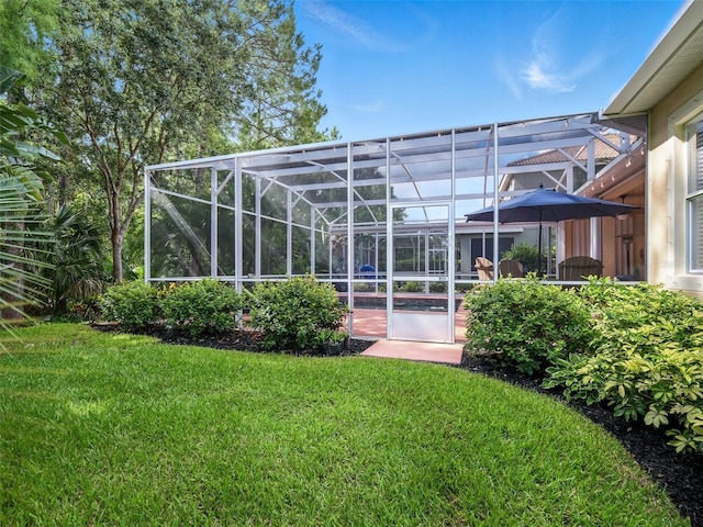 461 Luna Bella Ln, New Smyrna Beach, FL 32168 - back of house featuring a lawn, a lanai, and an outdoor pool