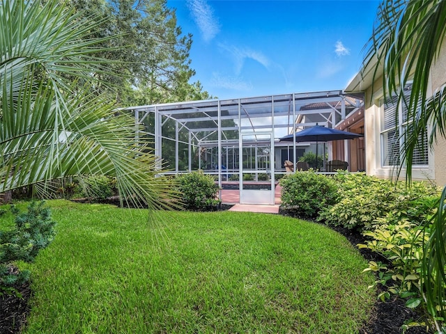 461 Luna Bella Ln, New Smyrna Beach, FL 32168 - back of house with a yard, a lanai, a pool, and a patio area