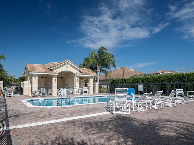 461 Luna Bella Ln, New Smyrna Beach, FL 32168 - community pool featuring a patio area and ceiling fan