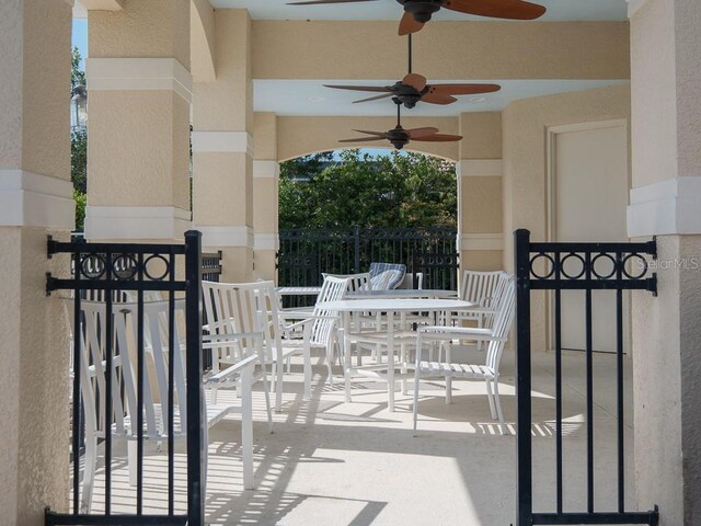 461 Luna Bella Ln, New Smyrna Beach, FL 32168 - balcony featuring ceiling fan