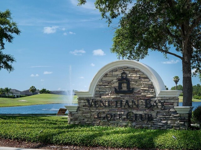 461 Luna Bella Ln, New Smyrna Beach, FL 32168 - community sign with a yard and a water view