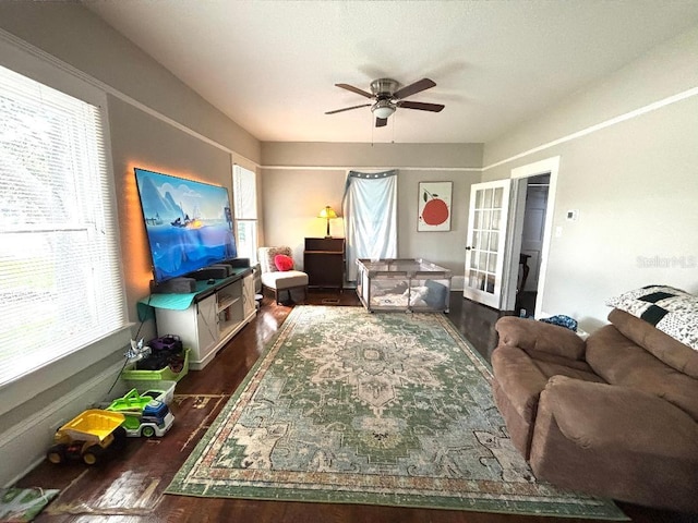 306 Murray St, New Smyrna Beach, FL 32168 - living room featuring wood finished floors and ceiling fan