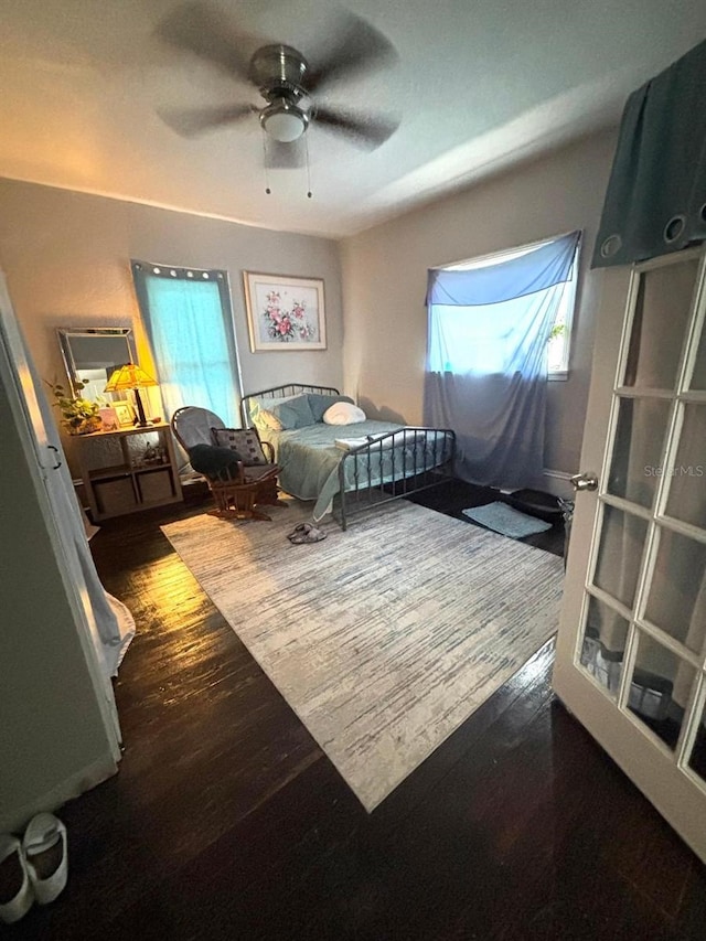 306 Murray St, New Smyrna Beach, FL 32168 - bedroom with wood finished floors and a ceiling fan