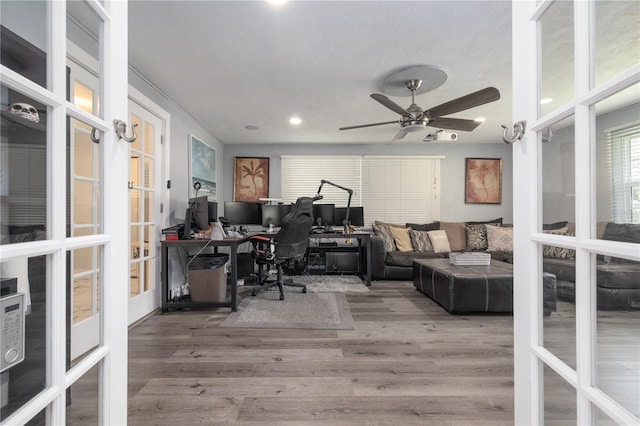 38 Fairway Cir, New Smyrna Beach, FL 32168 - office area featuring french doors, a ceiling fan, wood finished floors, and recessed lighting