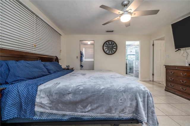 38 Fairway Cir, New Smyrna Beach, FL 32168 - bedroom featuring light tile patterned flooring and ceiling fan