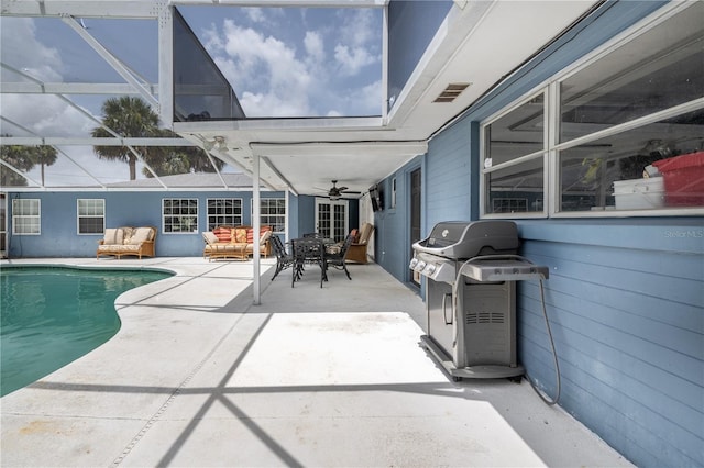 38 Fairway Cir, New Smyrna Beach, FL 32168 - view of patio / terrace featuring area for grilling, an outdoor pool, a ceiling fan, and glass enclosure