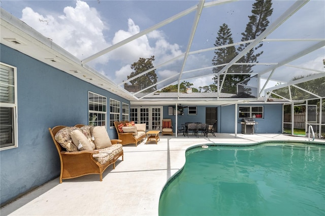 38 Fairway Cir, New Smyrna Beach, FL 32168 - swimming pool featuring outdoor lounge area, a patio, and a lanai