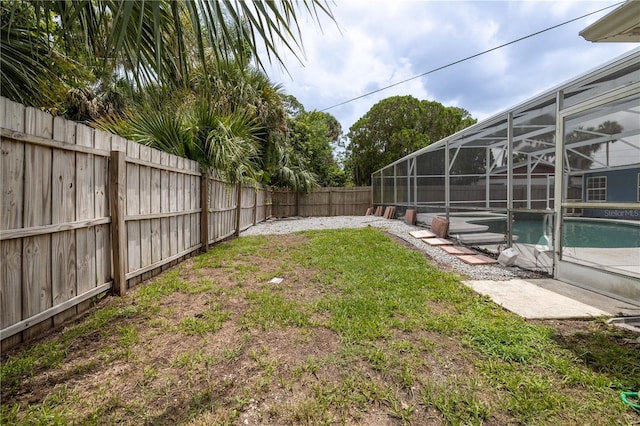 38 Fairway Cir, New Smyrna Beach, FL 32168 - fenced backyard featuring a lanai and a patio area