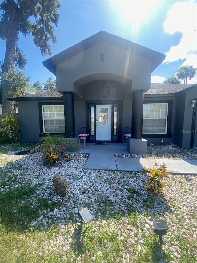 2122 Orange Tree Dr, Edgewater, FL 32141 - doorway to property with stucco siding