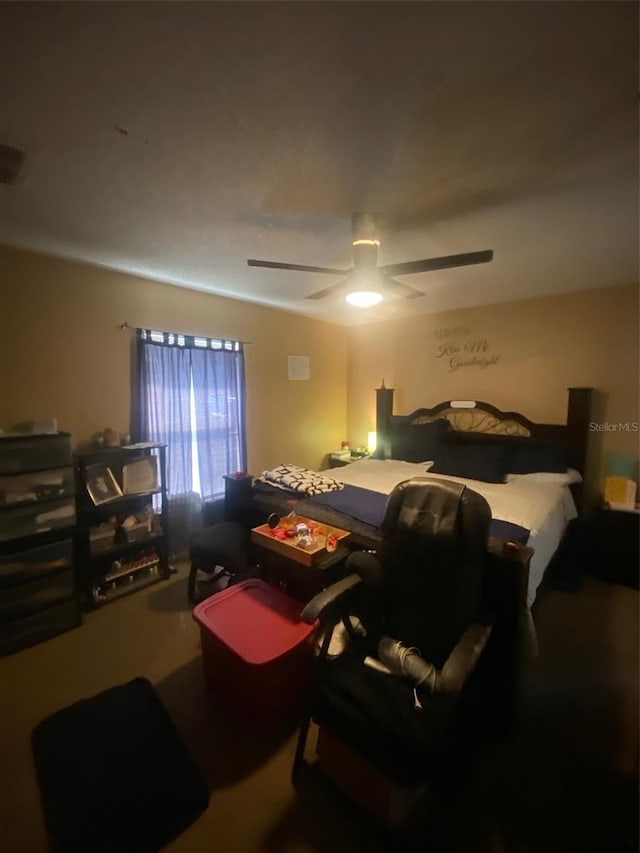 2122 Orange Tree Dr, Edgewater, FL 32141 - bedroom featuring ceiling fan and a desk