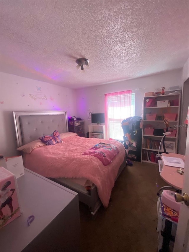 2122 Orange Tree Dr, Edgewater, FL 32141 - bedroom featuring a textured ceiling and carpet floors