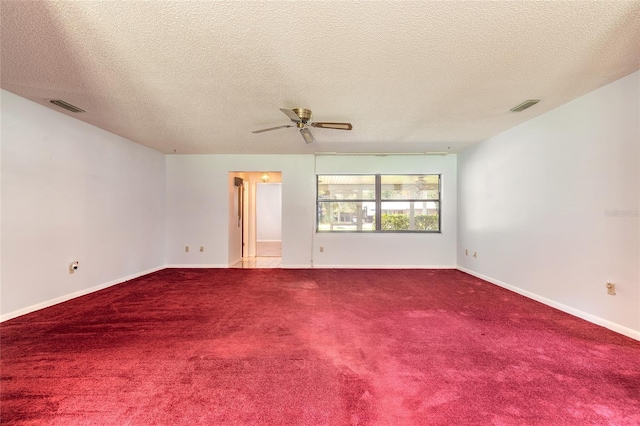 5060 Audubon Ave, De Leon Springs, FL 32130 - empty room with ceiling fan, carpet, and a textured ceiling