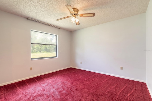 5060 Audubon Ave, De Leon Springs, FL 32130 - empty room with carpet flooring, ceiling fan, and a textured ceiling