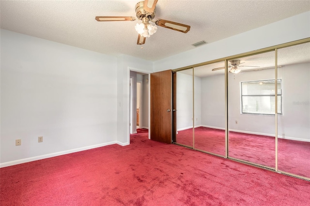 5060 Audubon Ave, De Leon Springs, FL 32130 - unfurnished bedroom with carpet floors, a textured ceiling, and ceiling fan