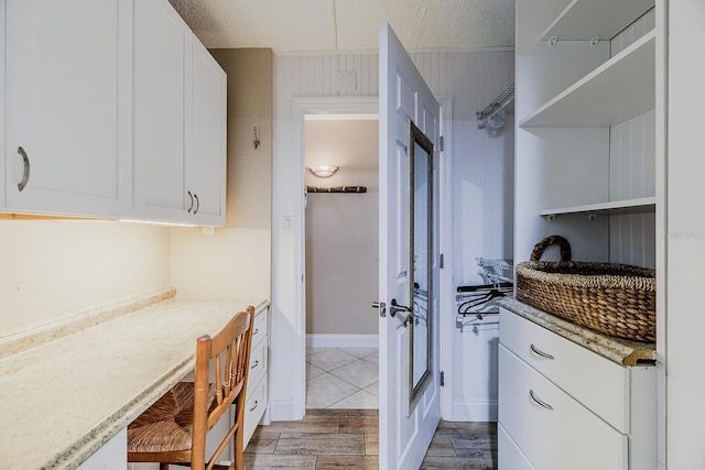 3700 S Atlantic Ave Unit 108, New Smyrna Beach, FL 32169 - bathroom with wood finished floors and french doors