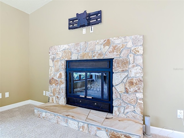 26 Creek Ct, Palm Coast, FL 32137 - detailed view of a fireplace and carpet flooring