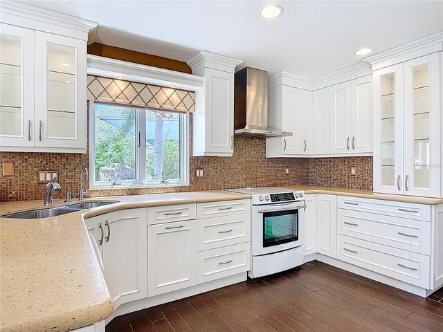 26 Creek Ct, Palm Coast, FL 32137 - kitchen featuring electric stove, wall chimney range hood, white cabinetry, dark wood-style flooring, and recessed lighting