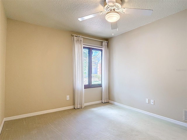 26 Creek Ct, Palm Coast, FL 32137 - unfurnished room with light carpet, a ceiling fan, and a textured ceiling