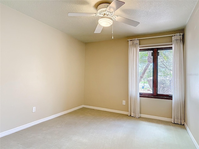 26 Creek Ct, Palm Coast, FL 32137 - unfurnished room featuring light colored carpet, a textured ceiling, and a ceiling fan