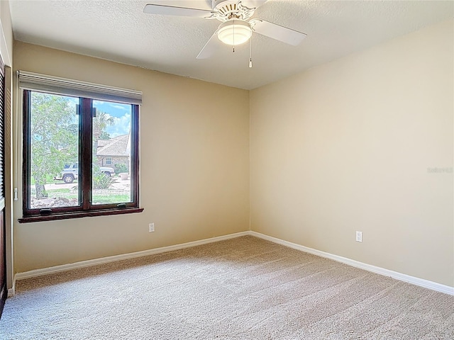 26 Creek Ct, Palm Coast, FL 32137 - carpeted empty room with a ceiling fan and a textured ceiling