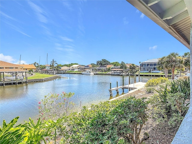 26 Creek Ct, Palm Coast, FL 32137 - water view featuring nearby suburban area and a dock