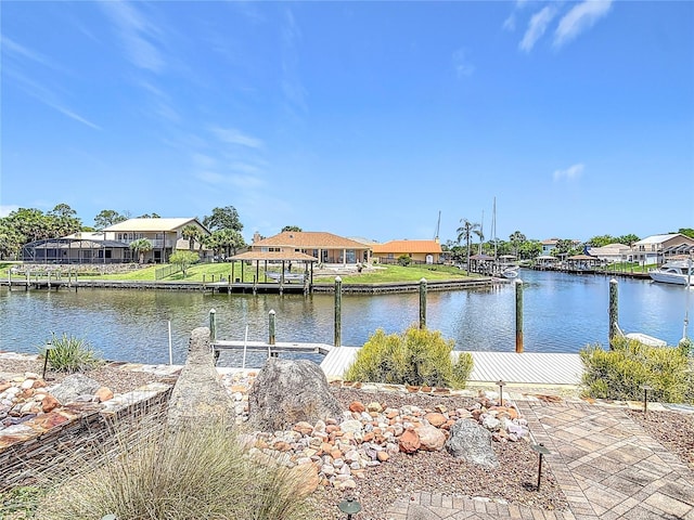 26 Creek Ct, Palm Coast, FL 32137 - water view featuring nearby suburban area and a boat dock