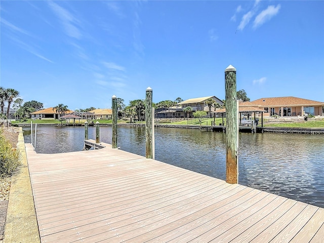 26 Creek Ct, Palm Coast, FL 32137 - dock featuring a residential view and a water view
