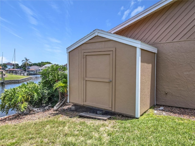 26 Creek Ct, Palm Coast, FL 32137 - view of shed featuring a water view