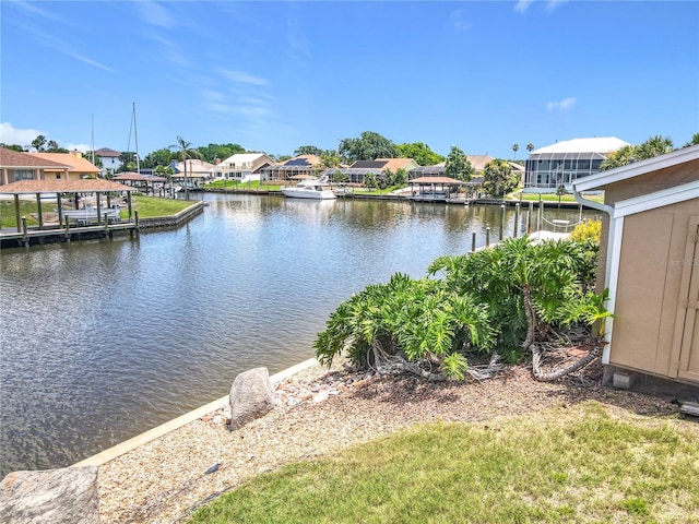 26 Creek Ct, Palm Coast, FL 32137 - water view featuring nearby suburban area and a dock