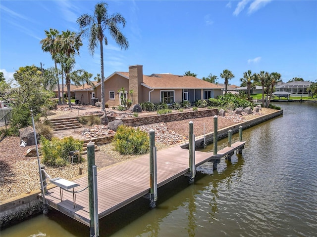26 Creek Ct, Palm Coast, FL 32137 - dock area featuring a water view