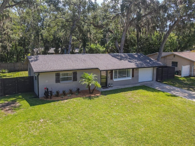 1421 Pine Tree Dr, Edgewater, FL 32132 - ranch-style house with brick siding, concrete driveway, roof with shingles, a garage, and view of wooded area