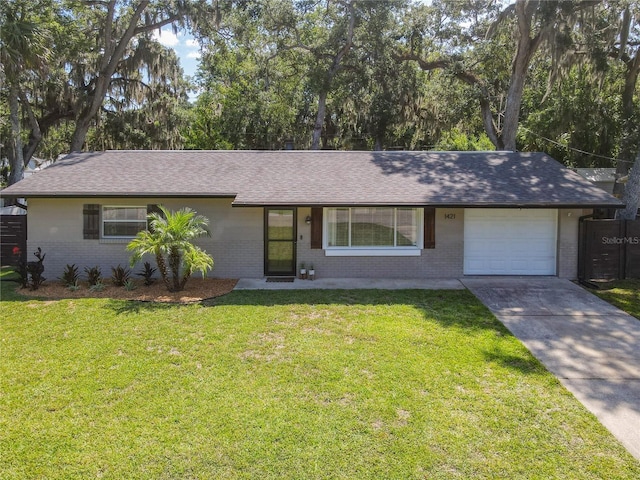 1421 Pine Tree Dr, Edgewater, FL 32132 - ranch-style home with brick siding, an attached garage, and a shingled roof