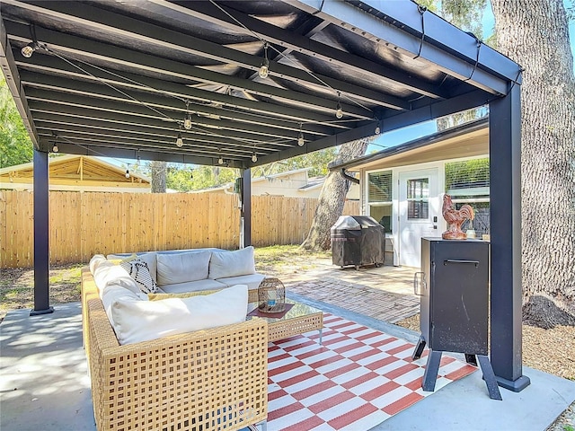 1421 Pine Tree Dr, Edgewater, FL 32132 - fenced backyard with a grill, a patio, and an outdoor hangout area